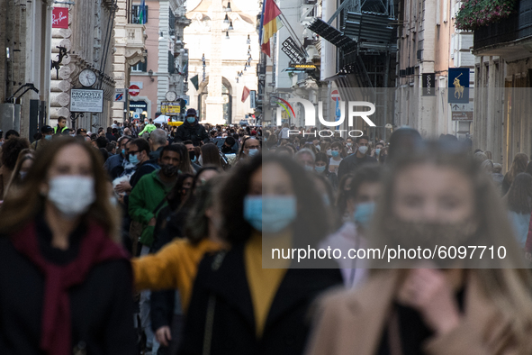 A view of the Corso street, Rome, Italy on October 17, 2020 crowded with people.  Despite the increase in Coronavirus cases, Roman citizens...
