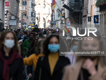 A view of the Corso street, Rome, Italy on October 17, 2020 crowded with people.  Despite the increase in Coronavirus cases, Roman citizens...