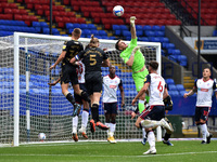 Bolton Wanderers' Billy Crellin ands Oldham Athletic's Tom Hamer and Carl Piergianni in action during the Sky Bet League 2 match between Bol...
