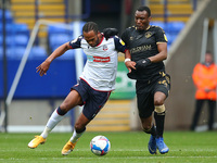  Boltons Nathan Delfouneso battles with Oldhams Brice Ntambwe during the Sky Bet League 2 match between Bolton Wanderers and Oldham Athletic...