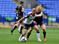 Bolton Wanderers' Ein Doyle ands Oldham Athletic's Carl Piergianni in action during the Sky Bet League 2 match between Bolton Wanderers and...