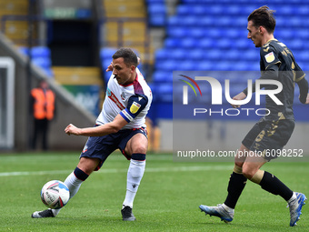Bolton Wanderers' Antoni Sarcevic ands Oldham Athletic's Callum Whelan in action during the Sky Bet League 2 match between Bolton Wanderers...