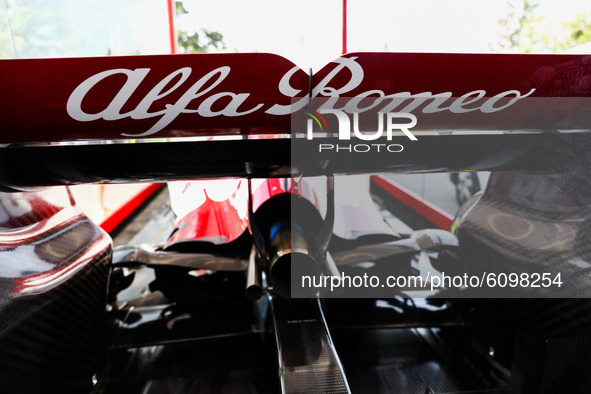 Alfa Romeo logo is seen on the Formula 1 car Sauber C-37 in the livery of Alfa Romeo Racing-Ferrari, in the showcase at a gas station in Kra...