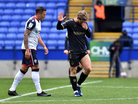 Bolton Wanderers' Antoni Sarcevic ands Oldham Athletic's Conor McAleny in action during the Sky Bet League 2 match between Bolton Wanderers...