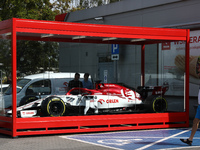 Formula 1 car Sauber C-37 in the livery of Alfa Romeo Racing-Ferrari is seen in the showcase at a gas station in Krakow, Poland on September...