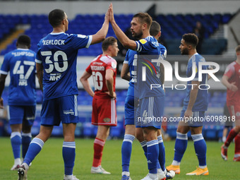 Ipswichs Luke Chambers And Myles Kenlock High Five after  the Sky Bet League 1 match between Ipswich Town and Accrington Stanley at Portman...
