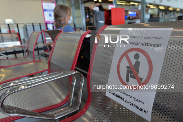 A view of a warning sign 'Keep Social Distance' seen inside the departures hall in Burgas Airport.
Passenger numbers at Bulgaria's coastal a...