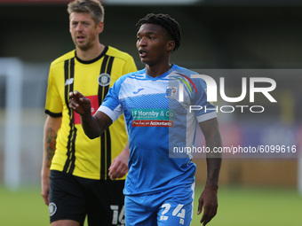 Kgosi Ntlhe of Barrow in action with Harrogate Town's Jonathan Stead during the Sky Bet League 2 match between Harrogate Town and Barrow at...