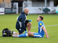 Barrow's Tom Beadling receives treatmnt during the Sky Bet League 2 match between Harrogate Town and Barrow at Wetherby Road, Harrogate, Eng...