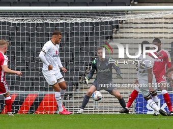 Cameron Jerome scores for Milton Keynes Dons, to take the lead making it 1 - 0 against Gillingham, during the Sky Bet League One match betwe...