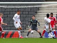 Cameron Jerome scores for Milton Keynes Dons, to take the lead making it 1 - 0 against Gillingham, during the Sky Bet League One match betwe...