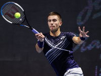 Borna Coric of Croatia returns the ball to Andrey Rublev of Russia during their ATP St. Petersburg Open 2020 international tennis tournament...