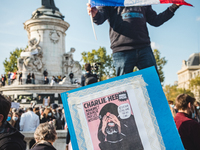 Several thousand people gathered on the Place de la Republique in Paris, France, on October 18, 2020 for a popular tribute to Samuel Paty, a...