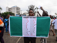Protesters demonstrate as Christian protesters gather for Sunday services in Lagos on October 19, 2020. As Christians hold Sunday Church Ser...