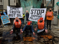 Activists from The Ocean Rebellion stage a protest outside the UN's International Maritime Organisation headquarters on the opening day of n...