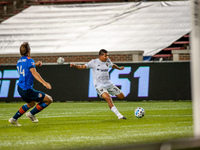 D.C. United midfielder, Edison Flores, takes a shot on goal during an MLS soccer match between FC Cincinnati and D.C. United at Nippert Stad...