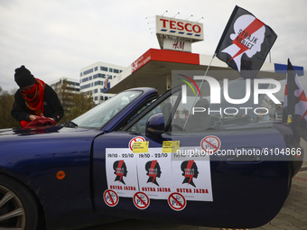 Protestors prepare to take part in a car demonstration organized by Women's Strike against imposing further restrictions on abortion law in...