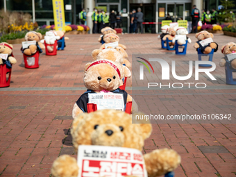 Teddy Bears are placed in a manner at in front of the Mapo district office during a press conferenceon October 20, 2020 in Seoul, South Kore...