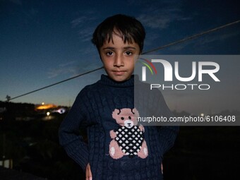 Portraits of young children refugees, minors boys and girls, asylum seekers from various countries such as Syria, Iraq, Afghanistan etc Refu...