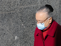A woman with the face mask on walks in downtown Kyiv, Ukraine, October 20, 2020. 173,788 active cases of Covid-19 confirmed across Ukraine....