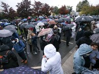 People gather at the middle school in Conflans-Sainte-Honorine, northwest of Paris, on October 20, 2020 during the 'Marche Blanche' in solid...