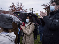 People gather at the middle school in Conflans-Sainte-Honorine, northwest of Paris, on October 20, 2020 during the 'Marche Blanche' in solid...