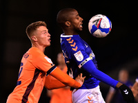 Oldham Athletic's Dylan Bahamboula and Carlisle United's George Tanner in action during the Sky Bet League 2 match between Oldham Athletic a...