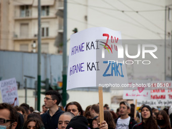 Activists hold a banner near a court in Athens on October 21, 2020 during the first day of the trial of Zak Kostopoulos. Zak was an LGBTQ ac...