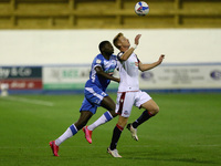  Yoan Zouma of Barrow in action with Eoin Doyle of Bolton Wanderers    during the Sky Bet League 2 match between Barrow and Bolton Wanderers...