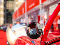 A driver at 'Mille Miglia' red carpet in Vittoria Square, Brescia, Italy on October 21, 2020. Although the departure is still in doubt, prep...