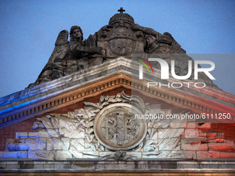 The townhall of Toulouse was illuminated with the French colors. In the circle, one can read 'RF' which stands for 'French Republic'. After...