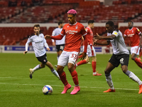 
Lyle Taylor of Nottingham Forest shields the ball from Wes Harding of Rotherham United during the Sky Bet Championship match between Nottin...