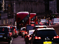 Cars and buses queue in a long traffic jam on Knightsbridge in London, England, on October 22, 2020. Government plans to expand the London C...