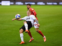 
Martyn Waghorn of Derby County holds off Nicolas Ioannou of Nottingham Forest during the Sky Bet Championship match between Nottingham Fore...