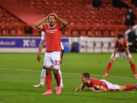 
Lyle Taylor of Nottingham Forest reacts after Ryan Yates of Nottingham Forest misses a chance at goal during the Sky Bet Championship match...