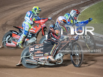 
Sam Masters (White) outside Richie Worrall (Red) with Chris Harris (Yellow) behind  during the Peter Craven Memorial Trophy at the National...