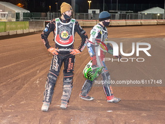 
Sam Masters checks the gate as Dan Bewley walks behind him during the Peter Craven Memorial Trophy at the National Speedway Stadium, Manche...