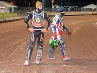 
Sam Masters checks the gate as Dan Bewley walks behind him during the Peter Craven Memorial Trophy at the National Speedway Stadium, Manche...