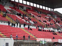 The grandstand of the Brianteo stadium in Monza with spectators distanced according to the anti-covid rules during the training at Serie B m...