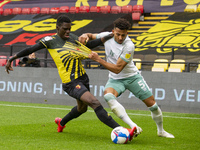  Ismaila Sarr of Watford and Lloyd Kelly of Bournemouth during the Sky Bet Championship match between Watford and Bournemouth at Vicarage Ro...