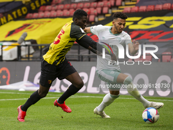  Ismaila Sarr of Watford and Joshua King of Bournemouth during the Sky Bet Championship match between Watford and Bournemouth at Vicarage Ro...