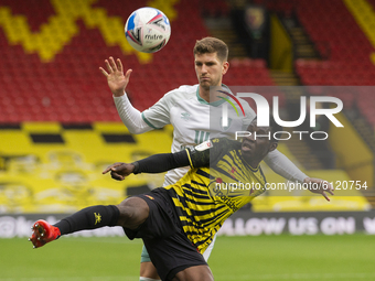 Ismaila Sarr of Watford and Chris Mepham of Bournemouth  during the Sky Bet Championship match between Watford and Bournemouth at Vicarage R...