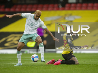  Joshua King of Bournemouth and Will Hughes of Watford  during the Sky Bet Championship match between Watford and Bournemouth at Vicarage Ro...