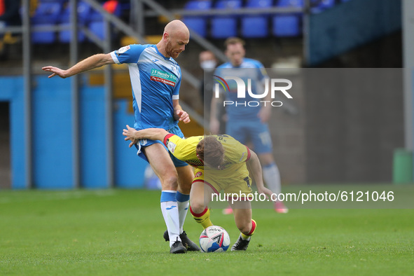 Jason Taylor of Barrow battles for possession with Walsall's Alfie Bates during the Sky Bet League 2 match between Barrow and Walsall at the...