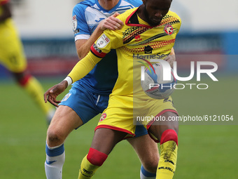Jason Taylor of Barrow in action with Walsall's Emmanuel Osadebe during the Sky Bet League 2 match between Barrow and Walsall at the Holker...