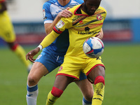 Jason Taylor of Barrow in action with Walsall's Emmanuel Osadebe during the Sky Bet League 2 match between Barrow and Walsall at the Holker...