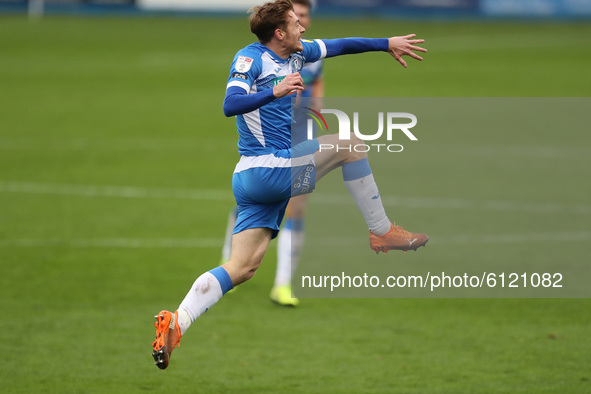 Barrow's Luke James celebrates after scoring their second goal during the Sky Bet League 2 match between Barrow and Walsall at the Holker St...