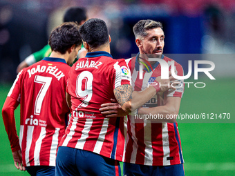 Joao Felix, Luis Suarez and Hector Herrera celebrates a goal during La Liga match between Atletico de Madrid and Real Betis at Wanda Metropo...