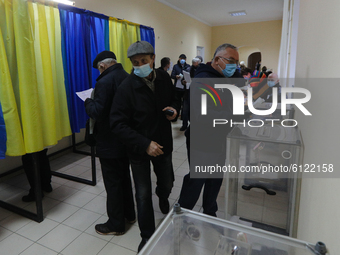 People cast their votes in Lviv, Ukraine, October 25, 2020. Ukrainians elect mayors, city councils  (