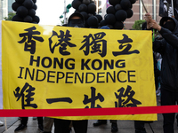 A protester holding a flag calling for Hong Kong Independence on October 25, 2020 in Taipei, Taiwan. On Saturday Taiwan, Tibetans, Hongkonge...